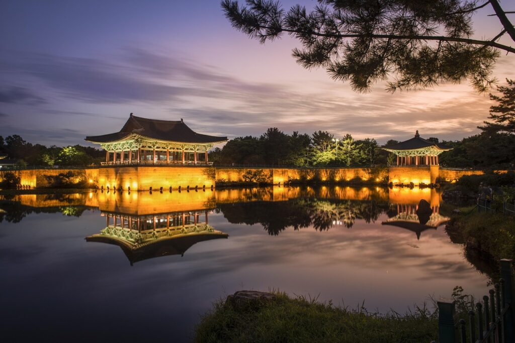 Peaceful Anapji Pond illuminated at night – a magical stop on your Travel Korea route.